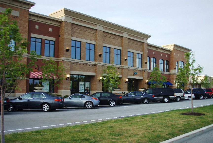 photo of a multi-use building with subtle colors complementing the building details