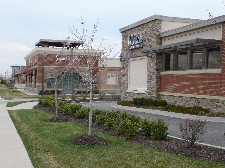 photo of a multi-use building with subtle colors complementing the building details