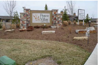 Photo of Landscaping configuration around a sign and proper distance from the intersection 