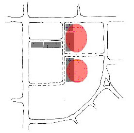 Diagram illustrating appropriate location for large footprint buildings in a Corner Green development pattern