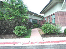 photo of a walkway with landscaping located between Pad Site Buildings
