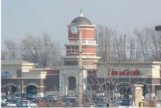 Photo of a commercial shopping center with a Clock Tower