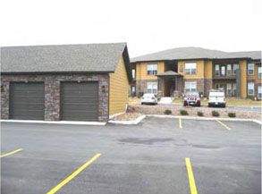 photo of residential building with accessory garages 