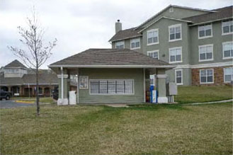 photo of residential building with accessory structure