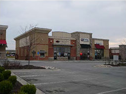 commercial building with multiple entrances with similar building character