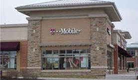 photo of a single-story commercial building with similar detailing on all visible walls