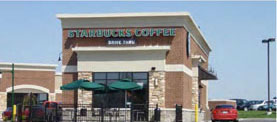 photo of a commercial building with similar detailing on all visible facades