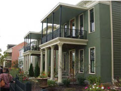residential building with front porch and balcony