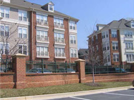 photo of residential building with vertical change of exterior materials 
