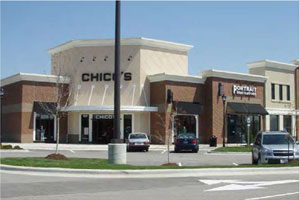 drawing of the front walls of a mixed-use commercial building with several smaller features on the facade