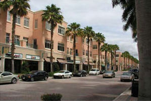 drawing of the front walls of a mixed-use commercial building with several smaller features on the facade