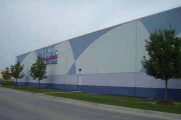 photo of a commercial building with several changes of exterior colors