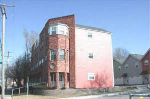 photo of a building with windows on both sides but unequal in size