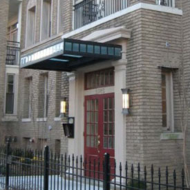 photo of front entrance with overhang on a General Urban street 