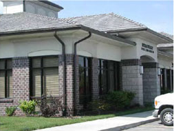 photo of a commercial building with downspouts on the exterior corners