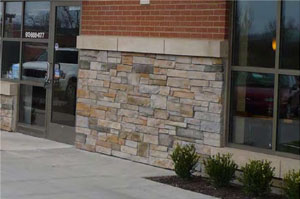 photo of a building with different types of stone materials 