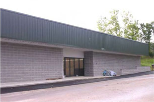 photo of a building with a flat roof and a plain facade