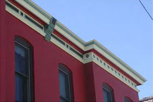 photo of a building front with cornice and parapet