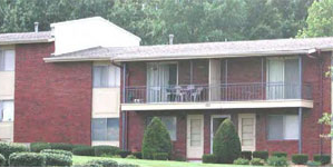 photo of a residential building with a sloped roof
