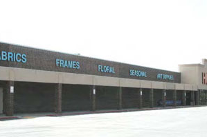 photo of a mixed-use building with no pitch or roof features