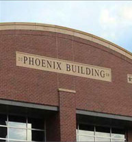 photo of sign above commercial building 