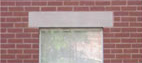 Close-up of a stone lintel installed above a window opening