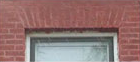Close-up of a jack arch masonry structure above a window opening