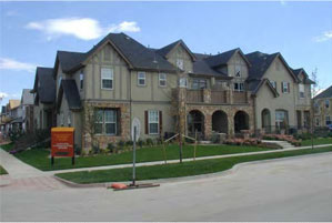 photo of a residential building front with front entrances