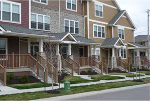 photo of a residential building with each dwelling unit having a front entrance