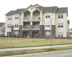 photo of a residential building front without front entrances